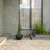LeisureMod Round Planter Pot in Fiberstone with Drainage Holes for Indoor and Outdoor Vessel Collection in Black - 3 of 4