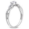 EVERLY JEWELRY | Sterling Silver 1/4 CT TGW Created White Sapphire and 1/10 CT TW Diamond Infinity Heart Ring - 2 of 4
