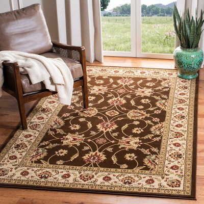 Brown and Ivory 4' x 6' Hand-Knotted Synthetic Area Rug
