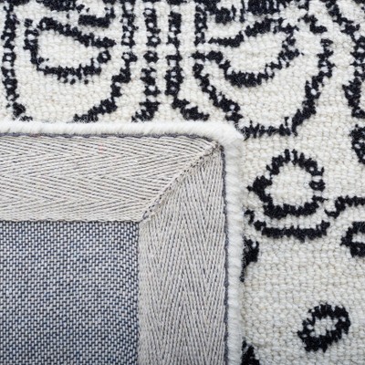 Ivory and Black Hand-Tufted Wool 8' x 10' Area Rug