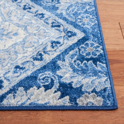 Handmade Round Blue and Ivory Synthetic Area Rug, 4'x6'