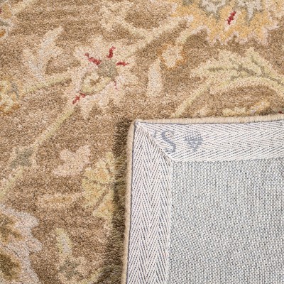 Handmade Tan and Ivory Wool Tufted Area Rug