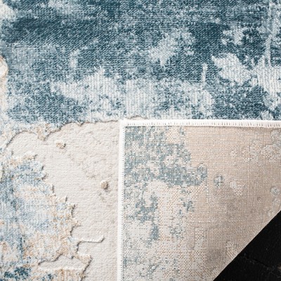 Beige and Turquoise Abstract Synthetic Area Rug, 8' x 10'