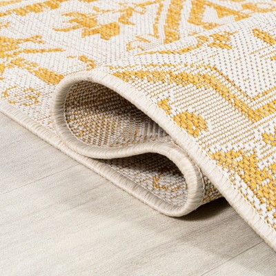 4' x 6' Cream and Yellow Synthetic Bohemian Medallion Area Rug