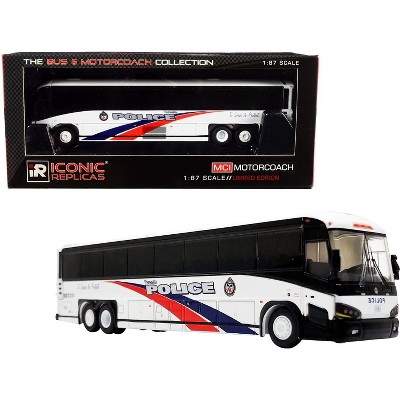 MCI D4505 Motorcoach Bus "Toronto Police" (Canada) White with Blue and Red Stripes 1/87 (HO) Diecast Model by Iconic Replicas