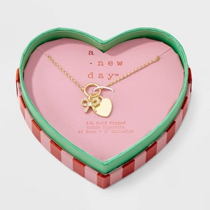 14K Gold Dipped Polished Heart and Cubic Zirconia Bow Charm Necklace - A New Day™ Gold - 1 of 4