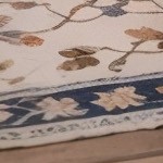 blue cushion/gray wicker