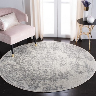 Chic Ivory & Silver 6' Round Synthetic Easy-Care Area Rug