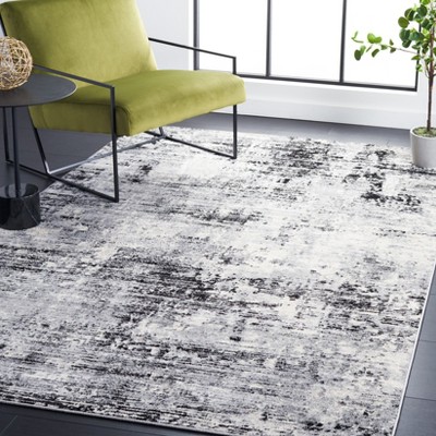 4' x 6' Black Abstract Easy Care Synthetic Rug