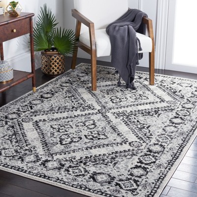 Ivory Round Stain-Resistant Synthetic Area Rug