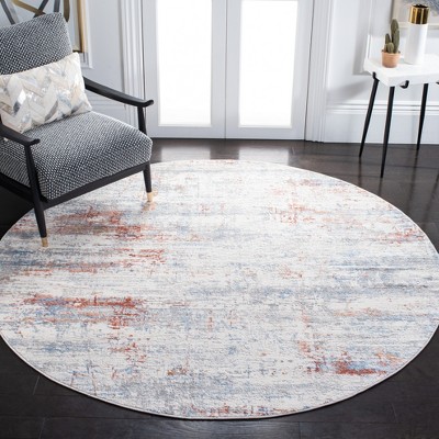 Ivory and Rust Synthetic 79" Reversible Round Rug