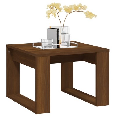 Oak square side table from front view with decorative items