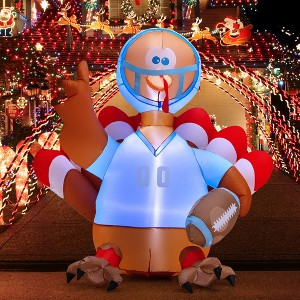 Costway 5 FT Inflatable Thanksgiving Turkey Football Player holding Rugby w/Lights - 1 of 4