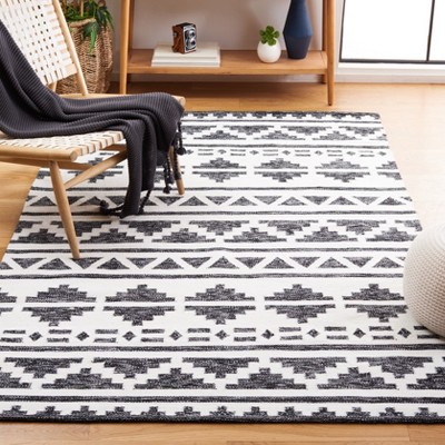 Handmade Black and Ivory Synthetic Flat Woven Area Rug, 3' x 5'
