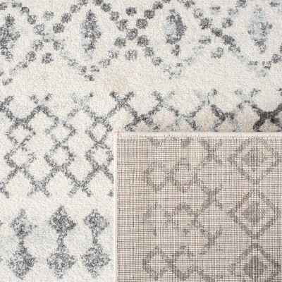 Ivory Geometric 4' x 6' Hand-Knotted Synthetic Area Rug