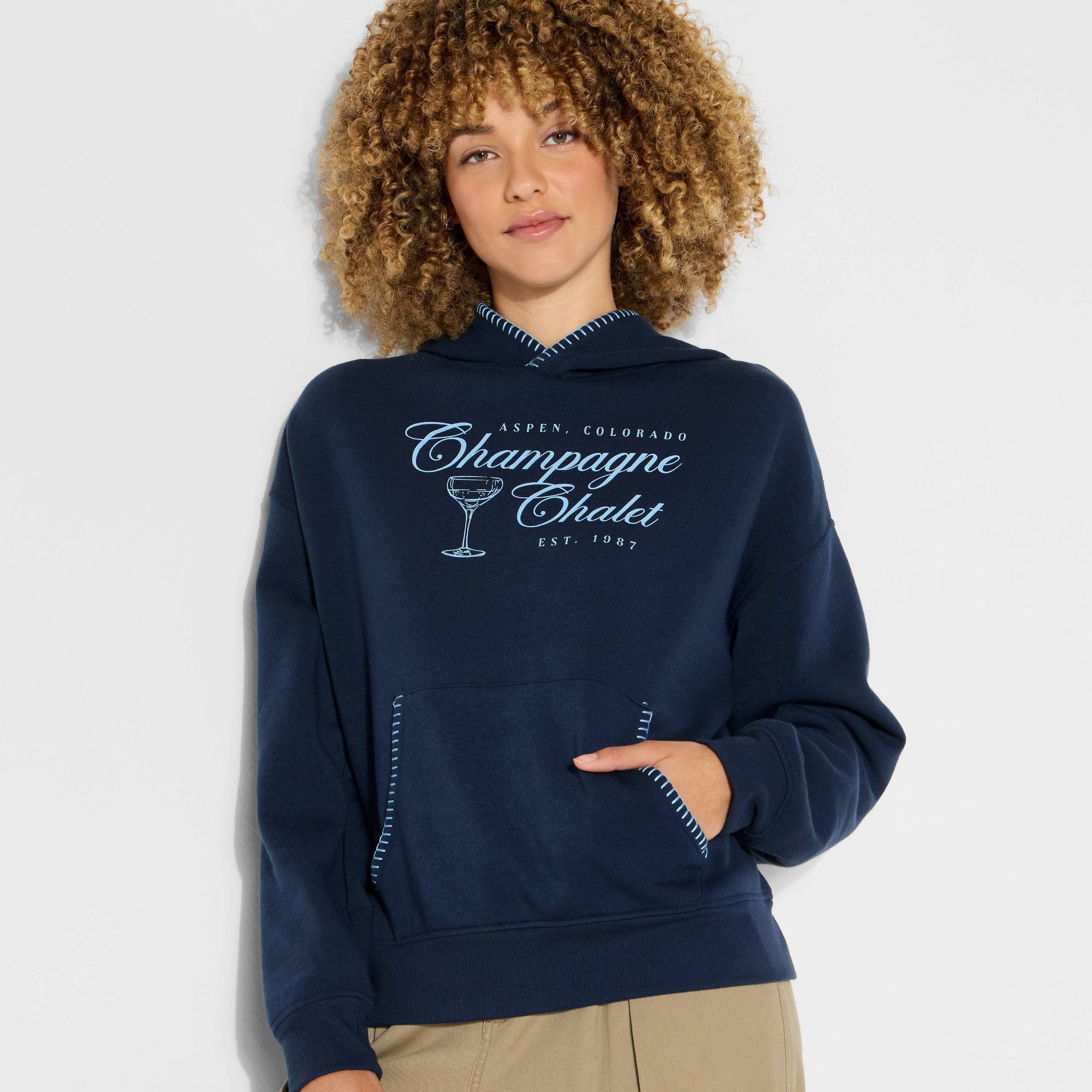 Women's Champagne Chalet Whipstitch Graphic Hooded Sweatshirt - Navy Blue