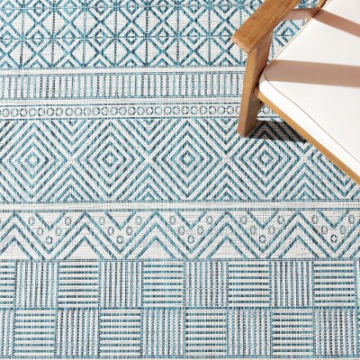 Ivory and Turquoise Rectangular Synthetic Indoor/Outdoor Rug