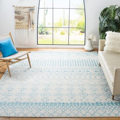 Ivory and Turquoise Hand-knotted Wool 6' x 9' Area Rug
