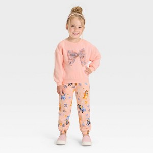 Toddler Girls' 2pc Bluey Bingo Floral Cozy Fleece Sweatshirt with Tulle Bow and Pants Set - Peach Orange - 1 of 4