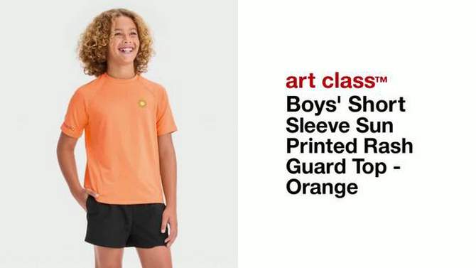 Boys&#39; Short Sleeve Sun Printed Rash Guard Top - art class&#8482; Orange, 2 of 5, play video