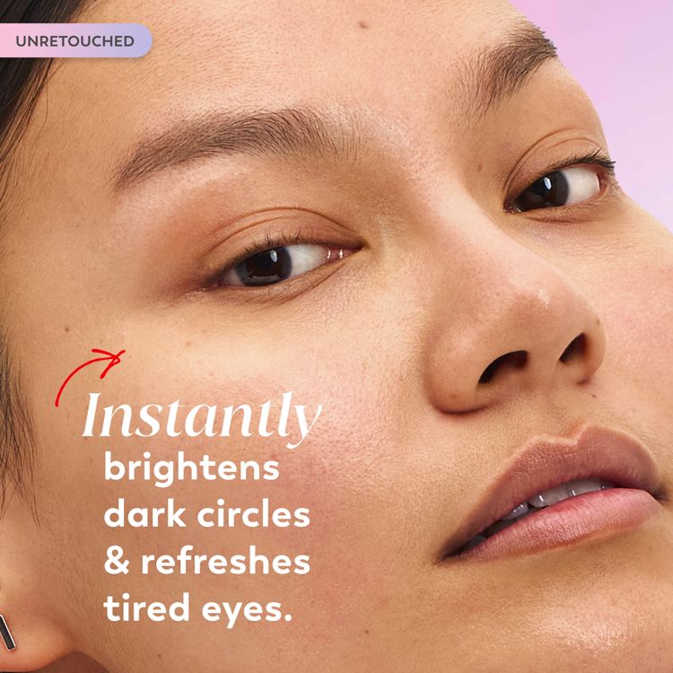 Close-up of a person's eye and cheek promoting an eye serum, with text on the image reading "Instantly brightens dark circles & refreshes tired eyes."