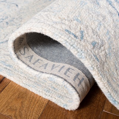 Elegant Light Blue & Ivory Wool 9' x 12' Hand-Tufted Area Rug