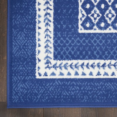 Ivory Geometric 7'10" x 10' Flat Woven Synthetic Area Rug