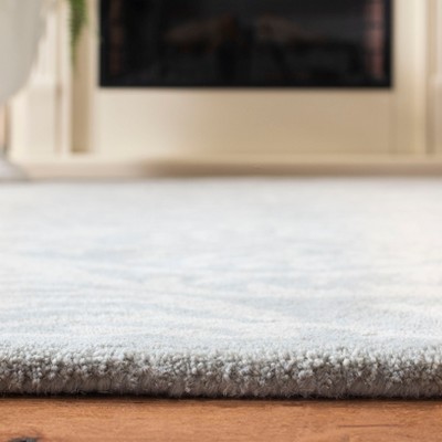 Hand-Tufted Gray Wool Rectangular Area Rug - 59" x 84"
