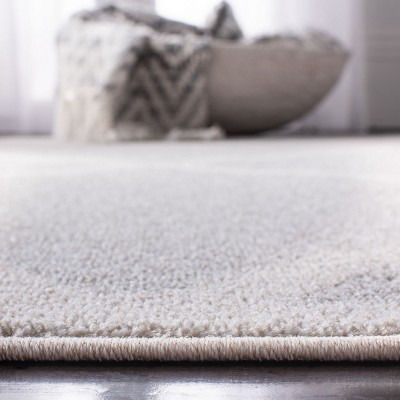 Beige and Light Grey Geometric Synthetic 8' x 10' Area Rug