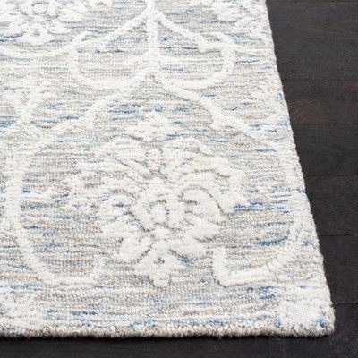 Light Blue and Ivory Hand-Tufted Wool Area Rug 4' x 6'