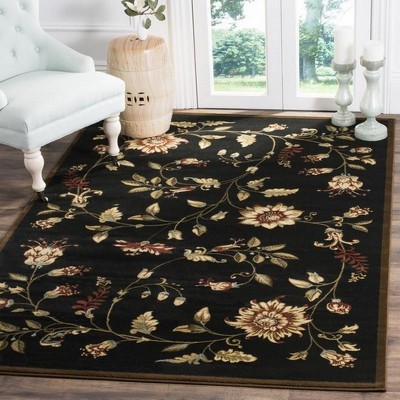 Elegant Floral Symphony 5' x 7' Black Hand-Knotted Area Rug