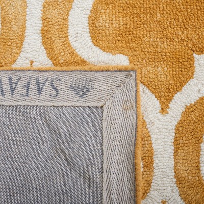 Ivory and Gold Hand-Tufted Wool 6' x 9' Rectangular Rug