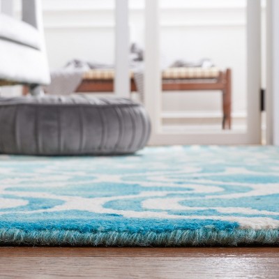 Turquoise and Ivory Hand-Tufted Wool Area Rug