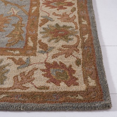 Elegant Heritage Hand-Tufted Wool Round Rug in Light Blue