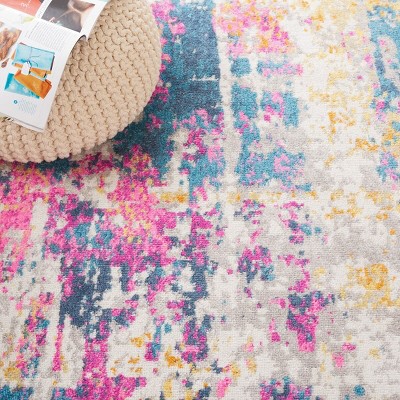 Ivory and Blue Abstract Synthetic Area Rug, 6' x 9'