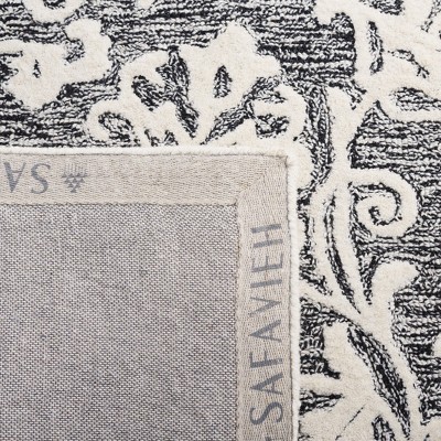 Black and Ivory Floral Hand-Tufted Wool Area Rug