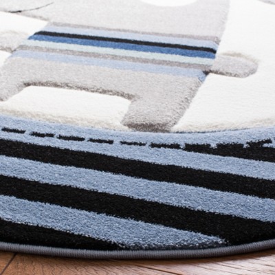 Ivory and Navy Round Kids Synthetic Area Rug