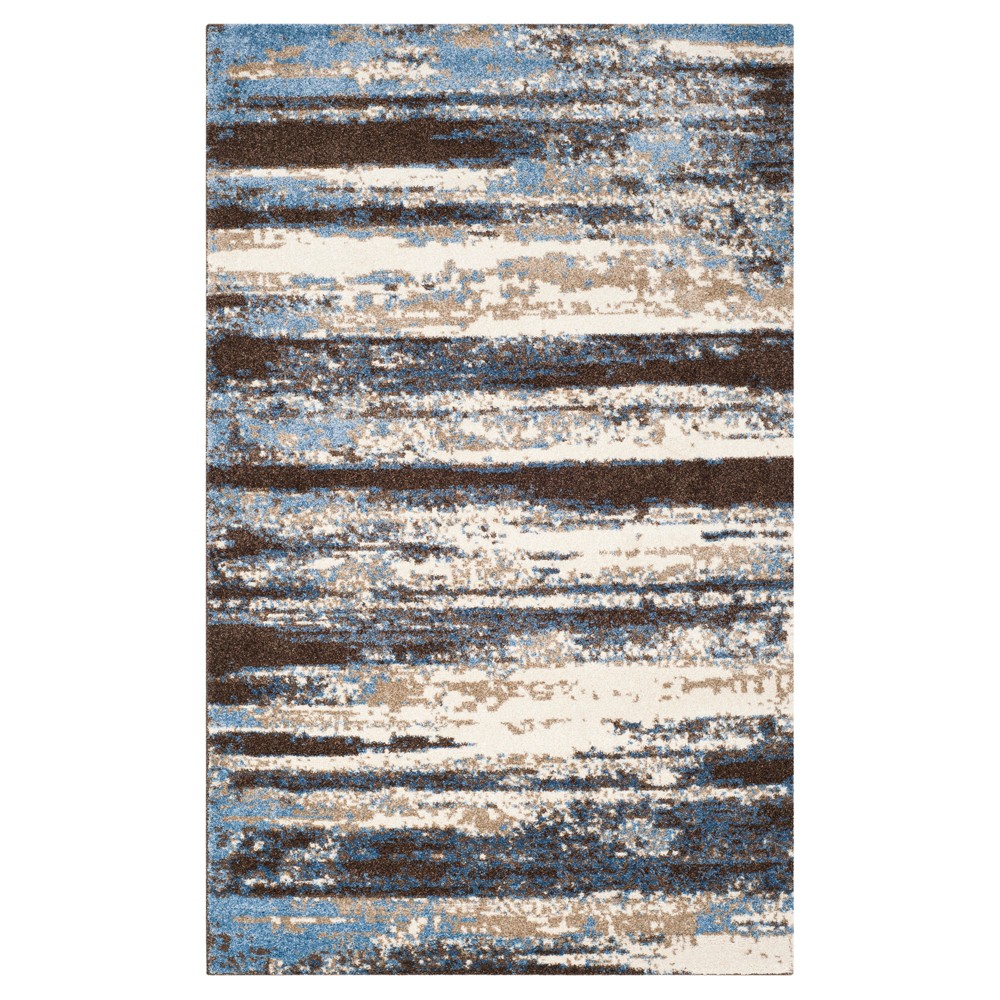 5'x8' Burst Area Rug Cream/Blue - Safavieh