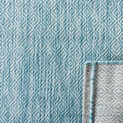 Aqua Delano Easy-Care 6'7" x 9'6" Synthetic Indoor/Outdoor Rug