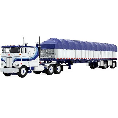Peterbilt 352 COE 110" Sleeper and 53’ Wilson Flatbed with Wagon White with Blue Stripes 1/64 Diecast Model by DCP/First Gear