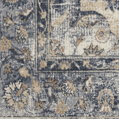 Ivory and Blue Rectangular Synthetic Area Rug 5' x 7'