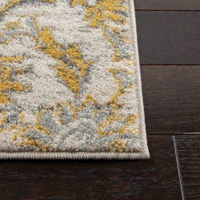 Elegant Ivory Gold 10' x 14' Hand-Knotted Synthetic Area Rug