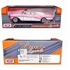 1957 Buick Roadmaster Convertible Pink and White 1/18 Diecast Model Car by Motormax - 3 of 3