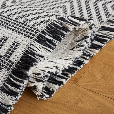 Ivory and Black Geometric Flat Woven Area Rug