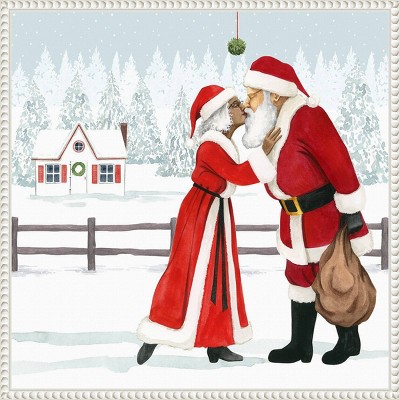 Santa and Mrs. Claus Kiss Under Mistletoe Framed Canvas Print
