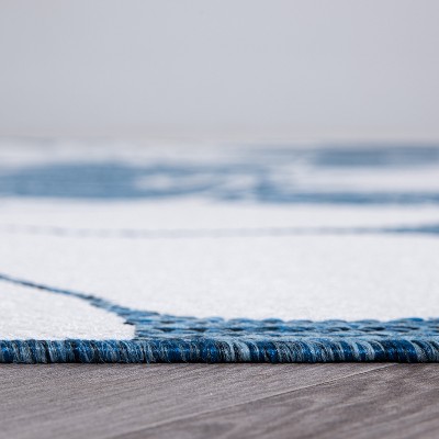 Navy Floral 5' x 7' Synthetic Flat Woven Reversible Rug