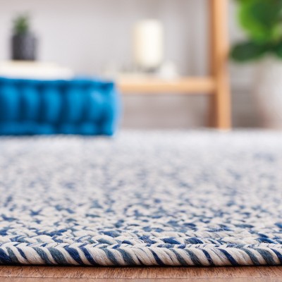 Handwoven Reversible Dark Blue and Ivory Synthetic Area Rug - 27"x6"