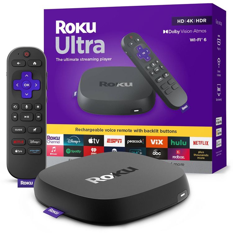 Roku Ultra – Black Roku Ultra streaming device with a rechargeable voice remote, shown in front of its purple packaging featuring various streaming service logos.