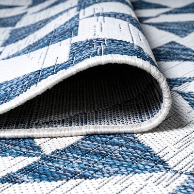 Ivory and Blue Geometric 4' x 6' Synthetic Area Rug