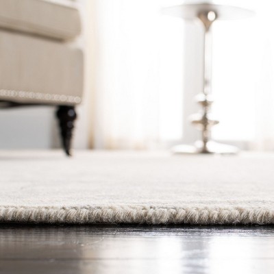 Handmade Light Grey and Ivory Wool Tufted Area Rug